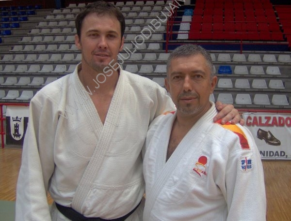 Con el campen Carlos Amores.jpg